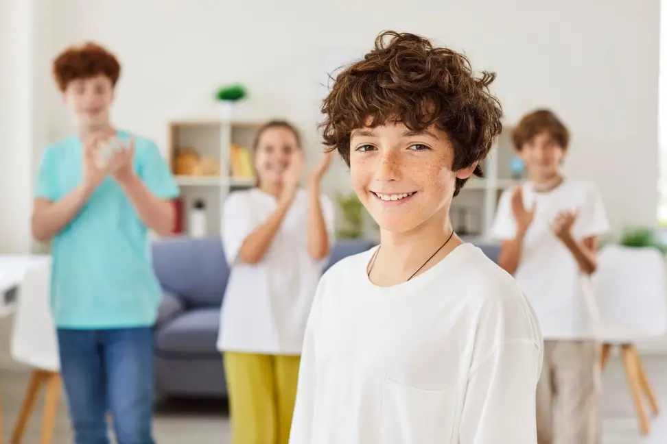 Smiling teen with healthy teeth, after All-On-4 Implants and restorative dentistry